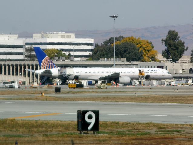 BOEING 757-300 (N57855) - KSJC - This is apprx Oct 2006 and the 1st 757-3 (as Continental) ever to land at SJC. Note terminal C is still here and I do not remember why the 757-3 was flown to SJC.