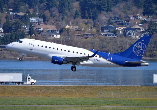 Embraer 170/175 (N176RS) - Best Jets International operating as DOW176 airborne off of 28R for Kansas City-Wheeler Downtown (KMKC/MKC). Arrived a few hours prior from St. Paul-Holman (KSTP/STP). Believe it or not, my first time seeing the shorter, base-model E-170 as these are a rare sight on the west coast!