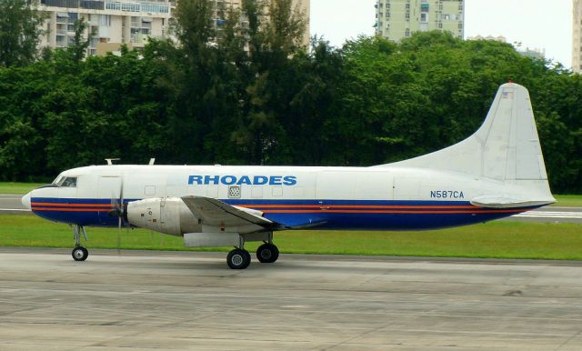 N587CA — - Rhoades Aviation Convair 640 N587CA (cn 463)  San Juan - Luis Munoz Marin International (SJU / TJSJ) Puerto Rico, 2009  Photo: Tomás Del Coro