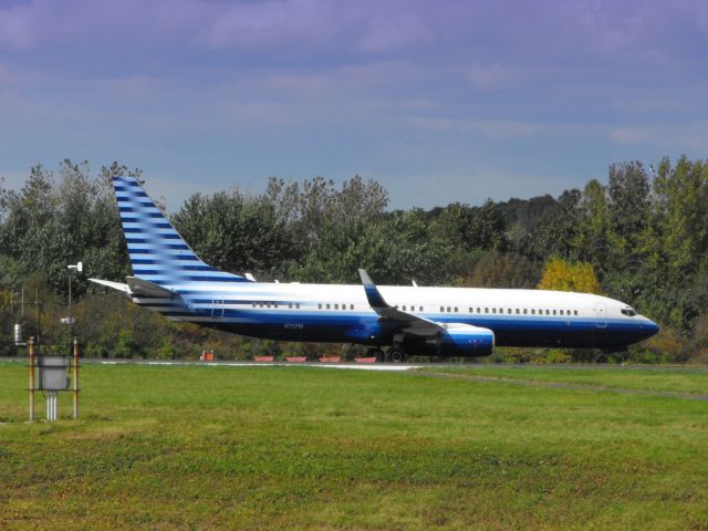 Boeing 737-700 (N737M) - This Boeing Jet is seen here taxing in  October of 2009.