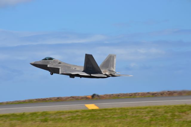 Lockheed F-22 Raptor — - A F-22 taking off from Honolulu from reef runway.