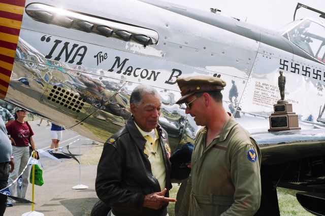 N1204 — - The late Tuskegee Airman Lee Archer in front of a replica of his WW2 P-51 "INA the Macon Belle"