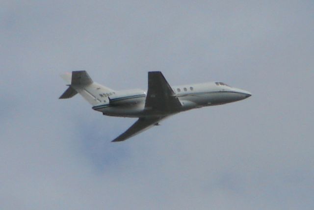 Hawker 800 (N9867) - Raytheon Hawker 800 departs Runway 14 at Sarasota-Bradenton International Airport (11/22/11)