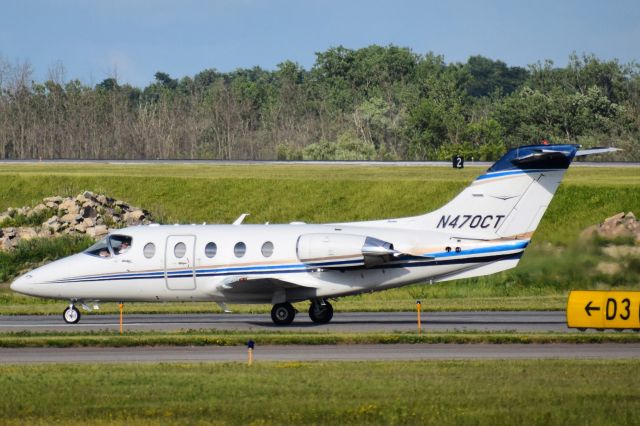 Beechcraft Beechjet (N470CT) - TMC470 taxiing into the FBO Ramp at the Buffalo Niagara International Airport from Sarasota/Bradenton (SRQ)