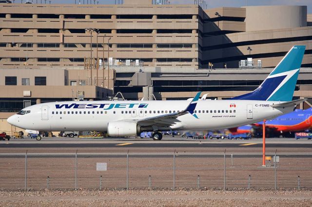 Boeing 737-800 (C-FDMB) - WestJet Boeing 737-8CT C-FDMB at Phoenix Sky Harbor on January 9, 2016. Itfirst flew on November 20, 2014. Its construction number is 60127. It was delivered to Westjet on June 26, 2014. 