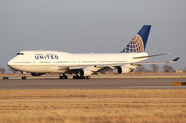 Boeing 747-400 (N127UA) - First B747 to have the United/Continental paint scheme.