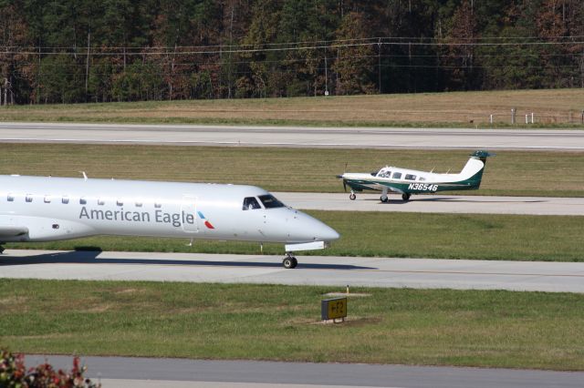 Piper Saratoga (N36546) - N36546, taxiing in after landing taxis past N836HK, taxiing out to runway 23R