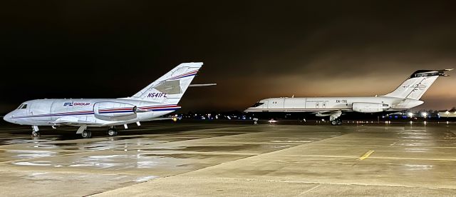 Dassault Falcon 20 (N541FL) - Two old birds resting on the ramp at KHUF. N541FL is a 57 year old FA20 and XA-TIG is a 56 year old DC91. 1/18/23. 