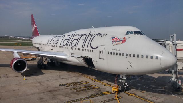 Boeing 747-400 (G-VROC) - This Virgin Atlantic Boeing 747-400 (registration G-VROC named Mustang Sally) preps for boarding of flight VS19 to San Francisco at Gate 15, Terminal 3, London Heathrow Aiport. Taken on Thursday 16th April 2015 : owned wholly by asmaffei 