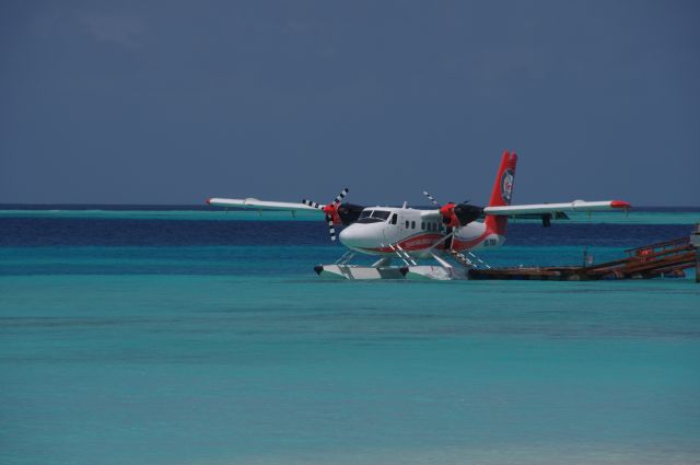 8Q-TMX — - A DHC Twin Otter moored up at a resort in the Maldives