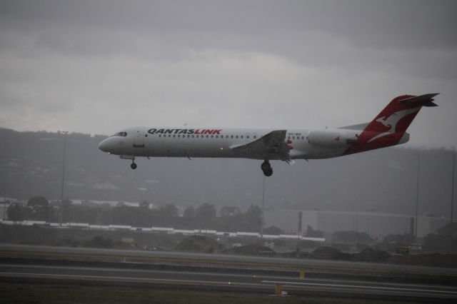 Fokker 100 (VH-NHI) - Network Aviation Fokker 100 battling the rain