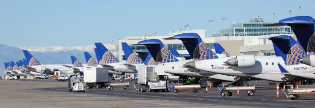 Canadair Regional Jet CRJ-700 (N751SK) - United line up on the south side of concourse B.