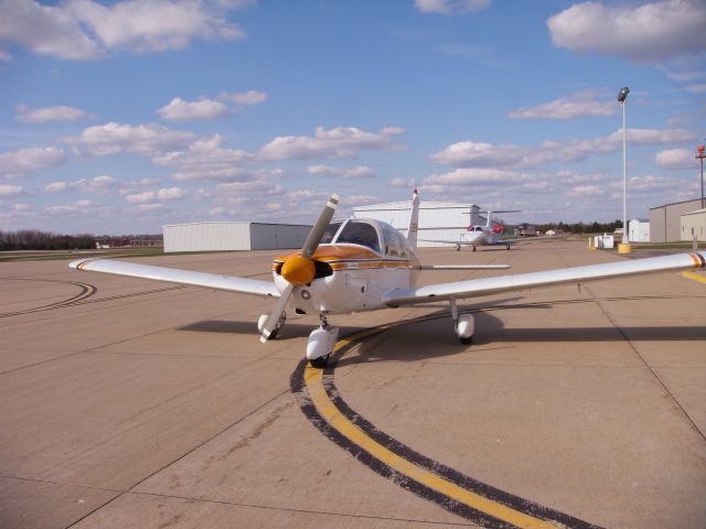 Piper Cherokee (N64MS) - Fueling at the FBO on a wonderful spring day.