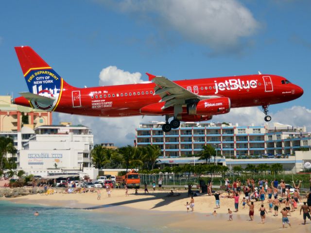 Airbus A320 (N615JB) - JetRed  bka as Blue Bravest. Seen here over Maho just about to touch down from Boston.