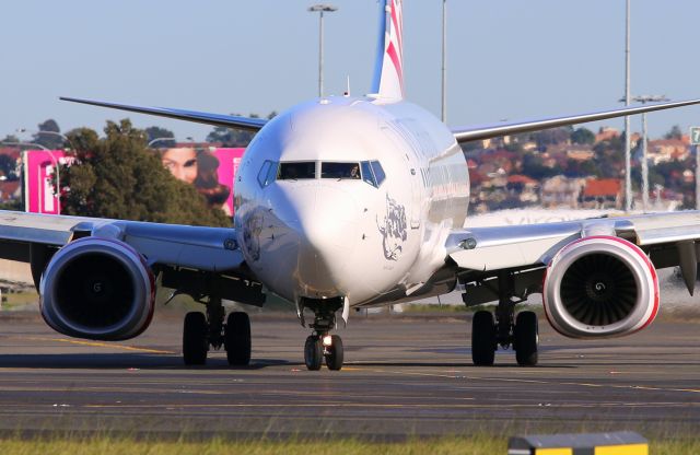 VH-YFC — - YFC Vacating 16R onto Bravo 7 after arrival. Taken from The Mound with a 70-200mm Highly croped