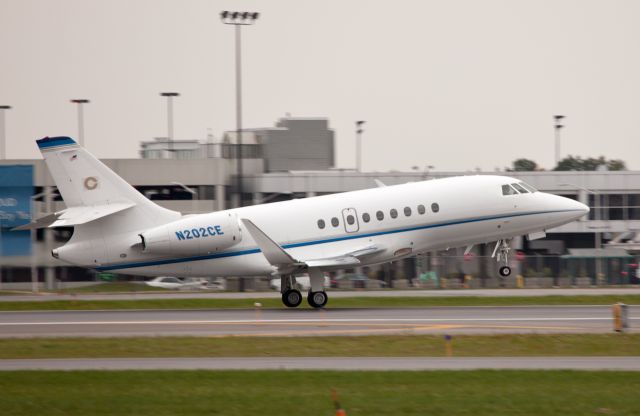 Dassault Falcon 2000 (N202CE) - The moment of lift off. Runway 10.