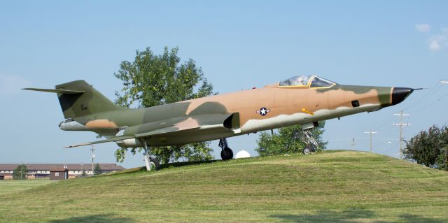 56-0185 — - An RF-101C Voodoo (56-0185) is displayed with obvious respect and care. The grass is cut and watered, and it is obviously rinsed off regularly because it shows very little "evidence" of being a bird "resting" object.