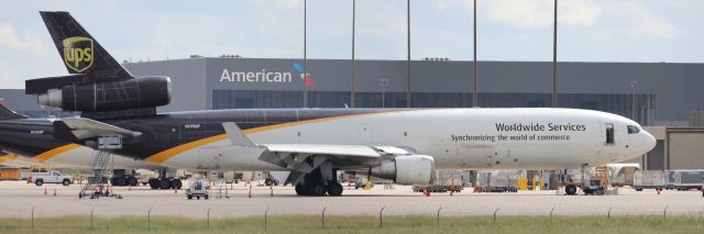 Boeing MD-11 (N295UP) - As seen from Founder's Plaza. Two pictures stitched together.