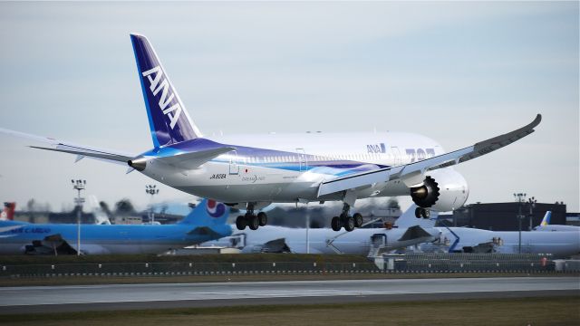 Boeing 787-8 (JA806A) - BOE117 nears touchdown on runway 16R to complete a flight test on 2/7/12.