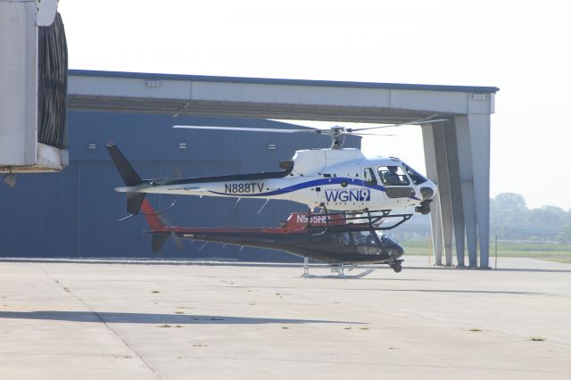 — — - Chicago TV news Helicopters getting fuel at B.Coleman FBO. 