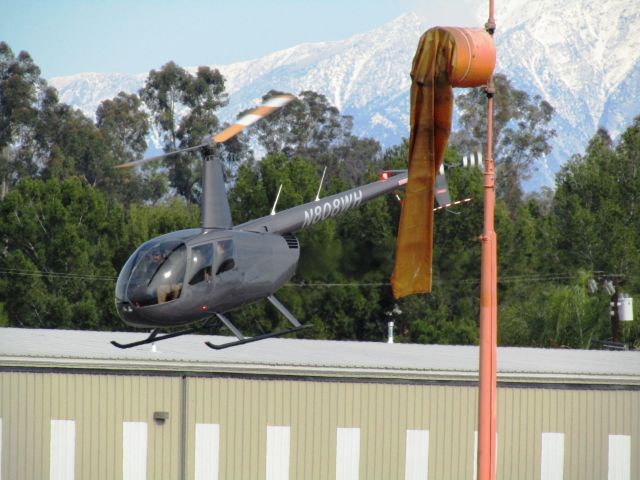 Robinson R-44 (N808WH) - Lifting off RWY 24