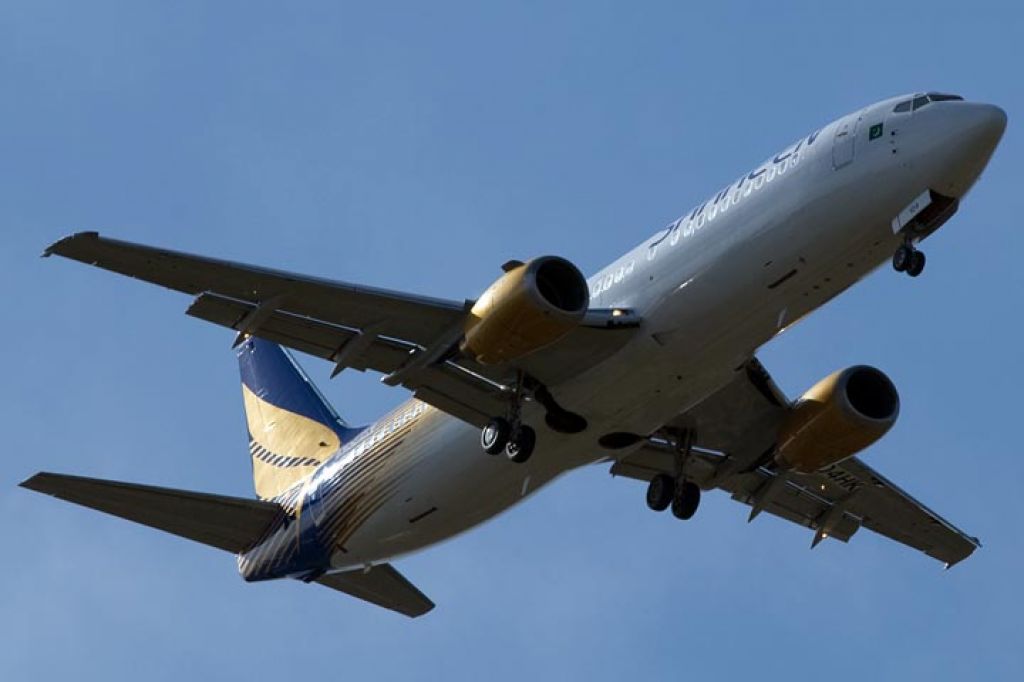 BOEING 737-400 (N104HK) - 3/30/12:  Shaheen Air B737-4H6 N104HK on a test flight from MIA doing a low approach to Opa-locka Executive Airport.  Scheduled for delivery flight on 4/3/12 via Bermuda.