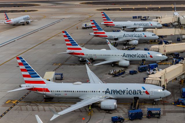 Boeing 737 MAX 8 (N323SG) - A packed American Airlines terminal at PHX on 2/13/23, the busiest day in PHX history, during the Super Bowl rush. Taken with a Canon R7 and Canon EF 100-400 II L lens.