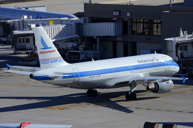 Airbus A319 (N744P) - American Airbus A319-112 N744P Piedmont Pacemaker at Phoenix Sky Harbor Airport on March 7, 2015. 