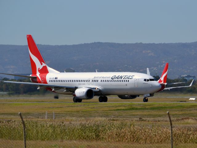 Boeing 737-800 (VH-VZB) - On taxi-way heading for take off on runway 05. Thursday 12th April 2012.