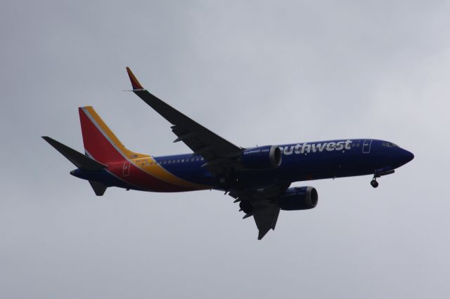 Boeing 737 MAX 8 (N8720L) - Southwest B737 MAX 8 returning to the skies seen arriving to Boston Logan from Nashville. I got out of work just in time to take this photo from the parking lot. 