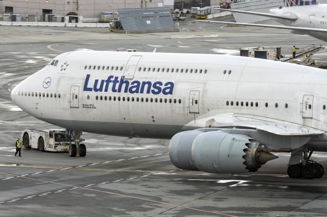 BOEING 747-8 (D-ABYK) - 1st of February, 2024: Being tugged out of the international gates cove at SFO departure to Frankfurt as flight LH 455. 