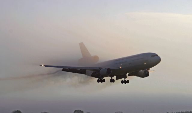 McDonnell Douglas DC-10 (N108AX) - Appearing from the fog like some mythological creature...