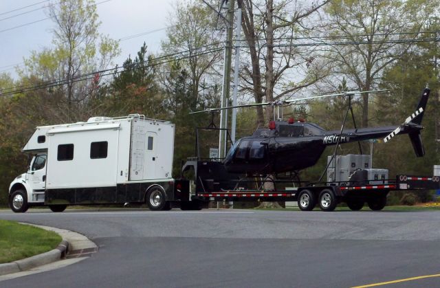 Bell JetRanger (N501HV) - HELIVISION LLC headed to the next race at KJQF - 3/22/12