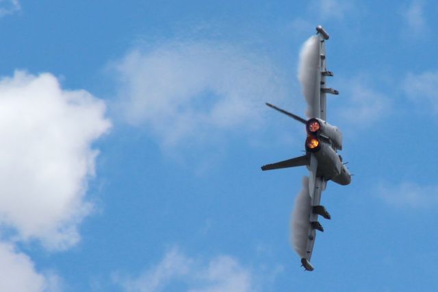 McDonnell Douglas FA-18 Hornet — - EAF-18 Growler from NAS Whidbey Island WA making some neat vapor on the wings during some High G Maneuvering. 