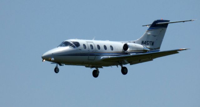 Beechcraft Beechjet (N451TM) - On final is this 2008 Hawker Beechcraft Beechjet 400A in the Spring of 2020.