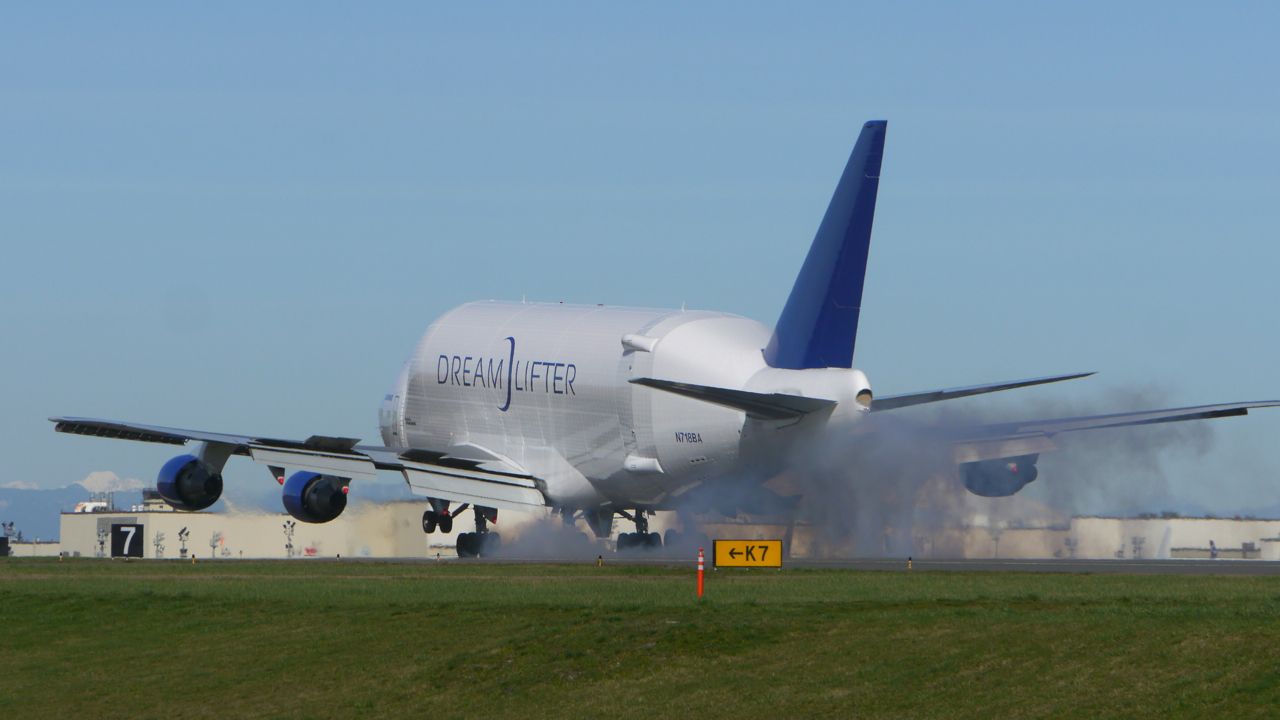 Boeing Dreamlifter (N718BA) - GTI4356 from KCHS makes tire smoke landing on Rwy 34L on 2/23/16. (ln 932 / cn 27042).