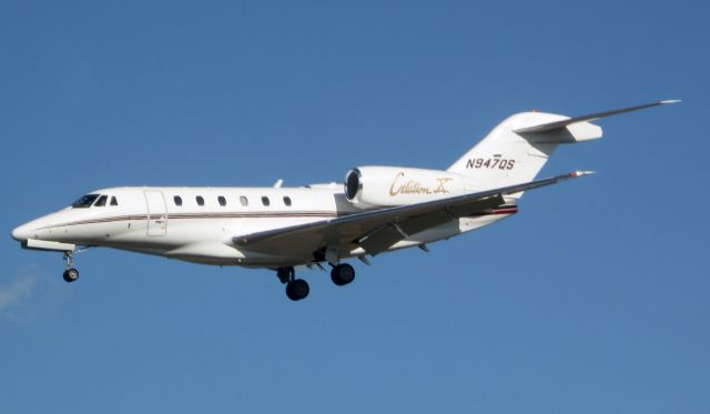 Cessna Citation X (N947QS) - Perfect landing under difficult wind conditions.