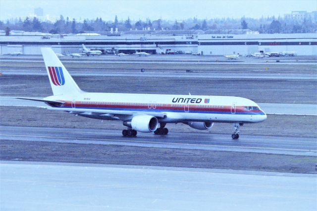 Boeing 757-200 (N519UA) - KSJC - rare photo for me of a United 757 in this color scheme headed to 12R for departure - 95% of the time 30L was used at SJC and I wasn't here everyday but this color 757 wasnt photographed widely from the parking structure.