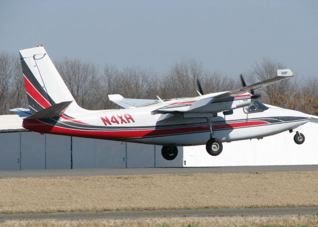 Aero Commander 500 (N4XR) - About to touch down at the Shreveport Downtown airport.