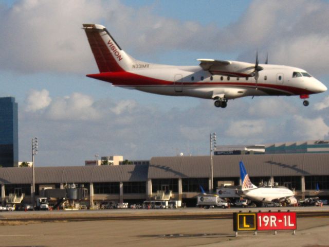 Dornier Do-28D-6 Turbo Skyservant (N331MX) - Landing on RWY 19R