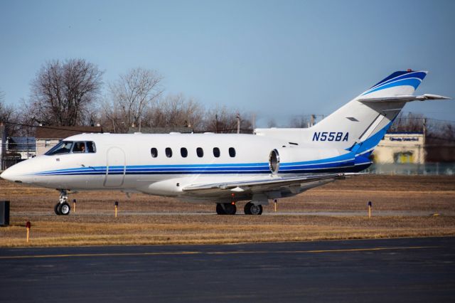 Hawker 800 (N55BA) - Privately owned Hawker 800XP departing from the FBO ramp at the Buffalo Niagara International Airport