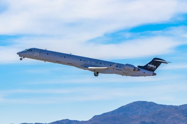 Canadair Regional Jet CRJ-900 (N920FJ) - Mesa Airlines CRJ900 taking off from PHX on 11/5/22. Taken with a Canon 850D and Tamron 70-200 G2 lens.