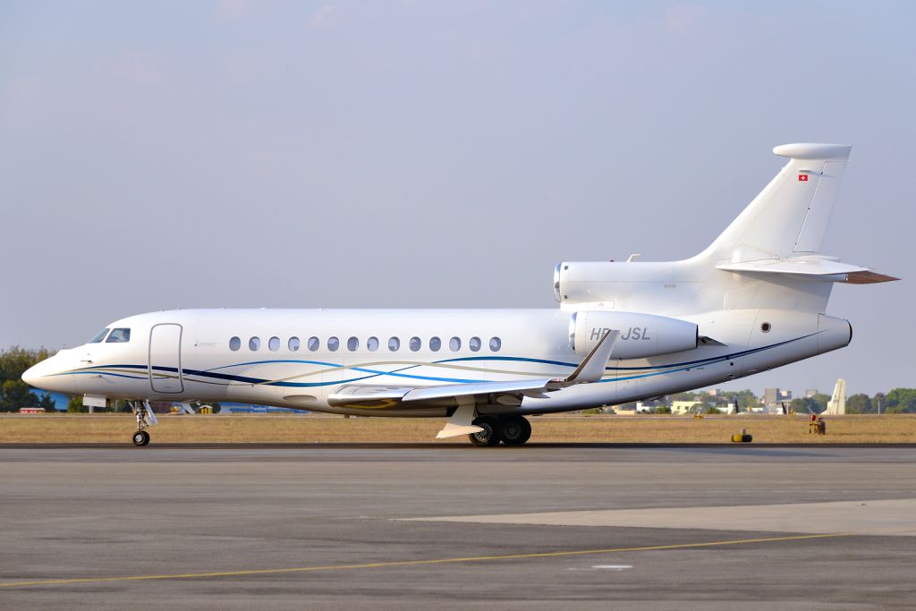 HB-JSL — - Taxiing out in the evening for a customer demo flight at Aero India 2015.
