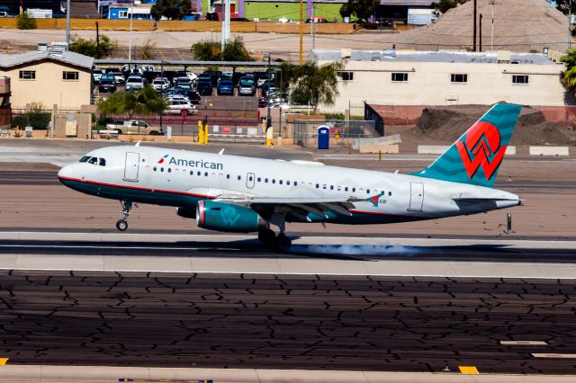 Airbus A319 (N838AW) - American Airlines A319 in America West retro livery landing at PHX on 10/22/22. Taken with a Canon 850D and Tamron 70-200 G2 lens.