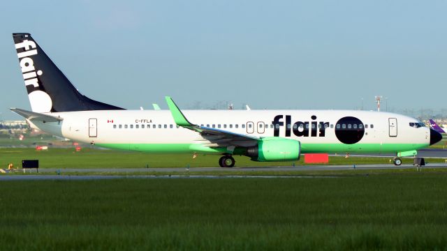 Boeing 737-800 (C-FFLA) - Holding short at sunrise