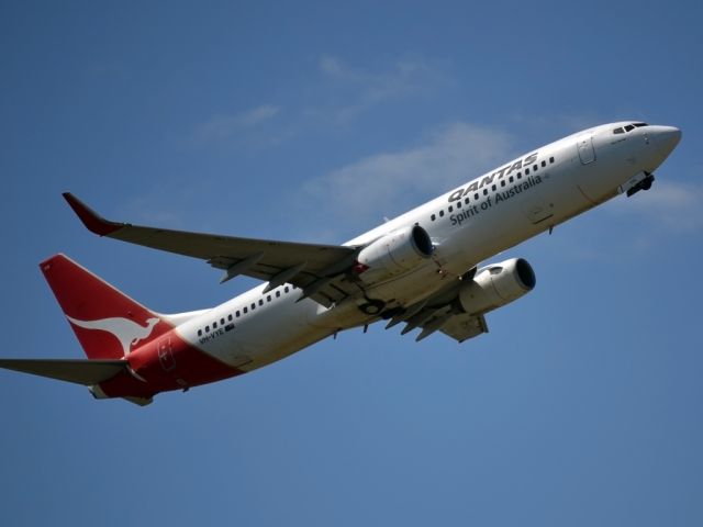 Boeing 737-800 (VH-VYE) - Getting airborne off runway 23.