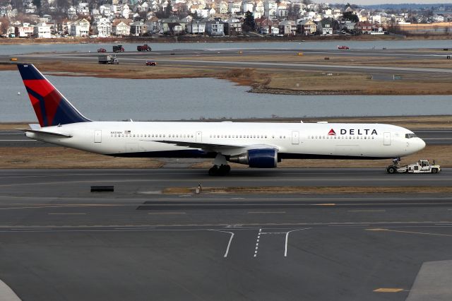 BOEING 767-400 (N833MH) - DL 59 from London being towed from the international gate