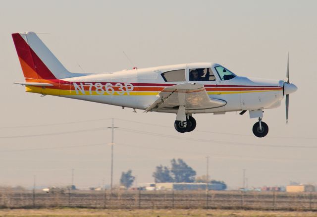 Piper Cherokee (N7863P) - Piper Cherokee on final, RWY Three-Zero, Merced Regional Airport (KMCE)