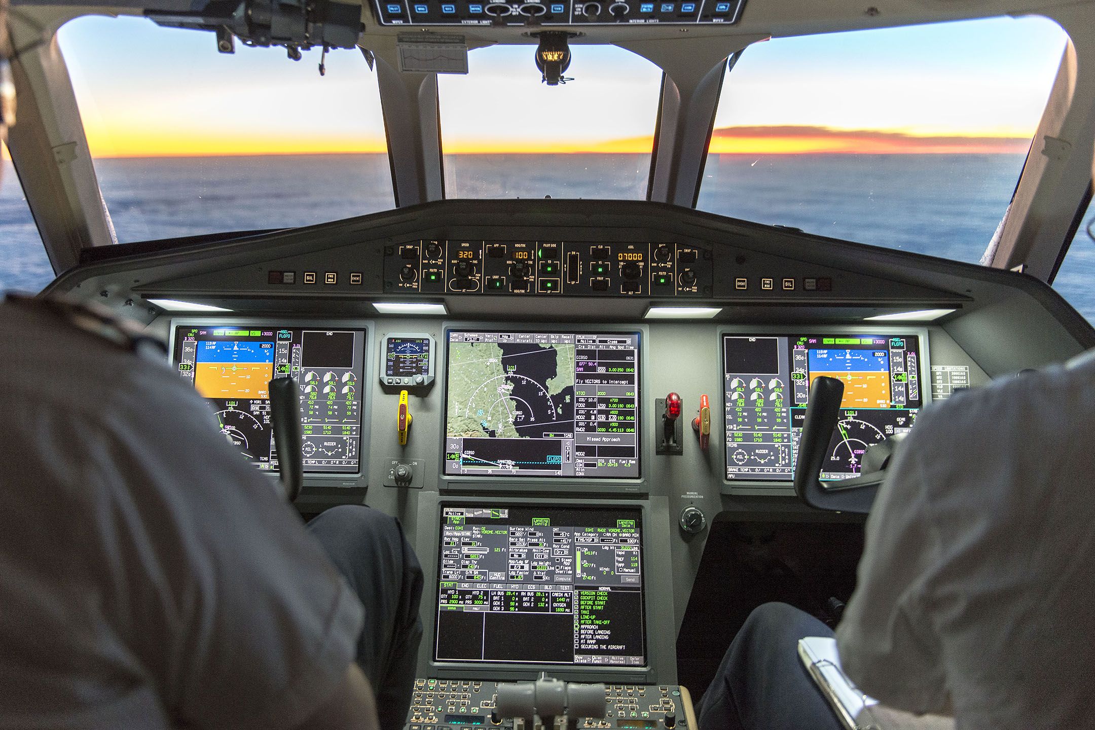 — — - Falcon 900EX inbound to Southampton Apt EGHI from Palm Beach KPBI just after sunrise - to stbd on centre screen are the Channel Islands Jersey and Guernsey and France top right.