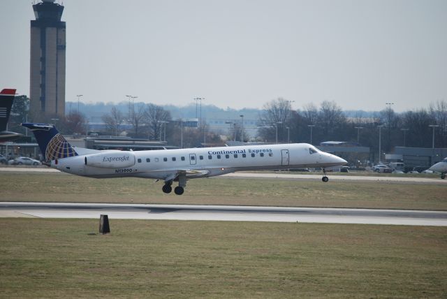 Embraer ERJ-145 (N13990) - Approaching runway 18C - 3/11/09